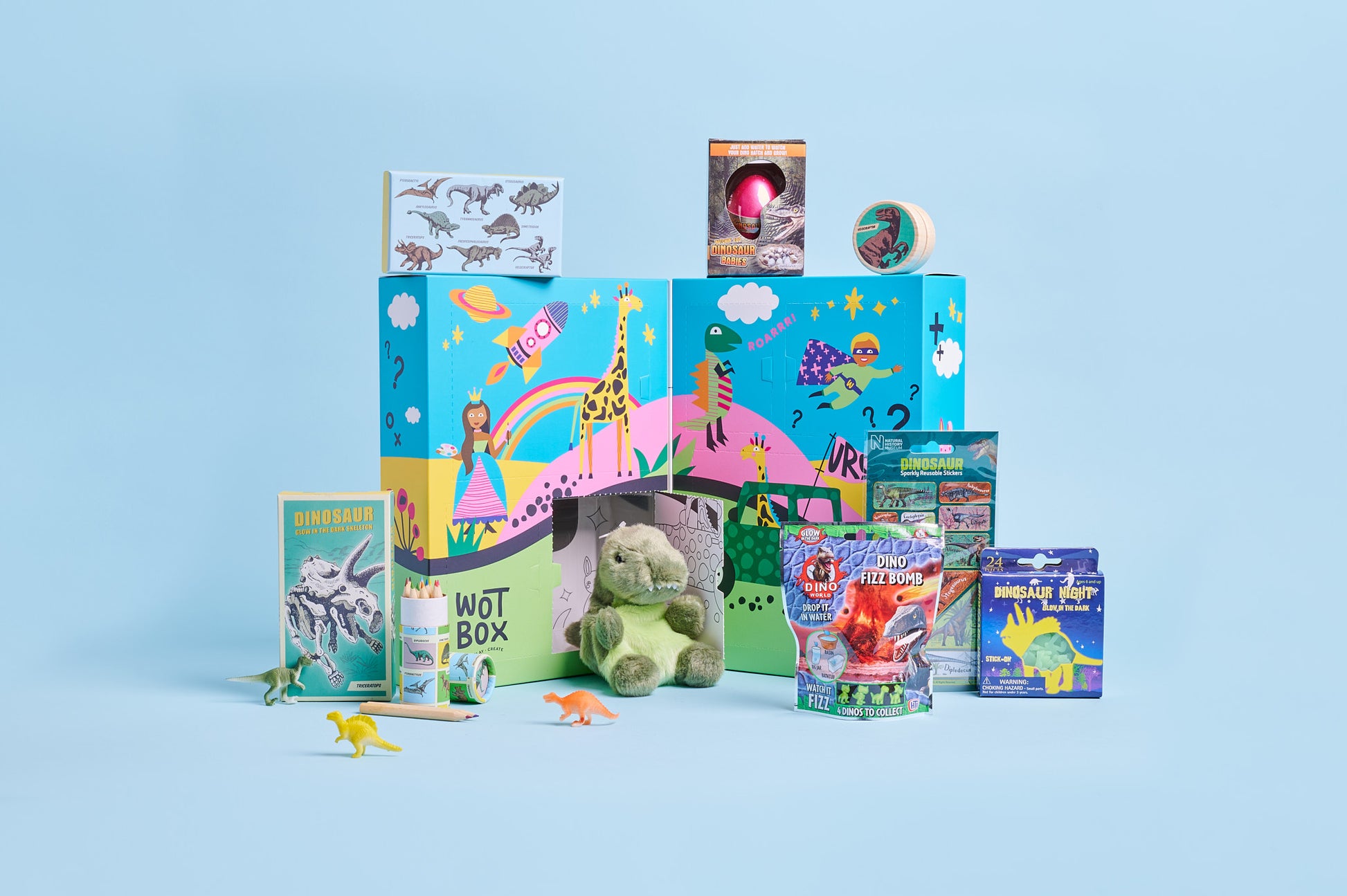 WOTBOX dinosaur adventures kids gift box. Open shot of the gift box with the contents around it